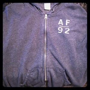 Blue zip up Abercrombie hoodie.